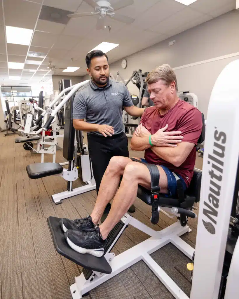 Client training on Nautilus Low Back Extension Machine