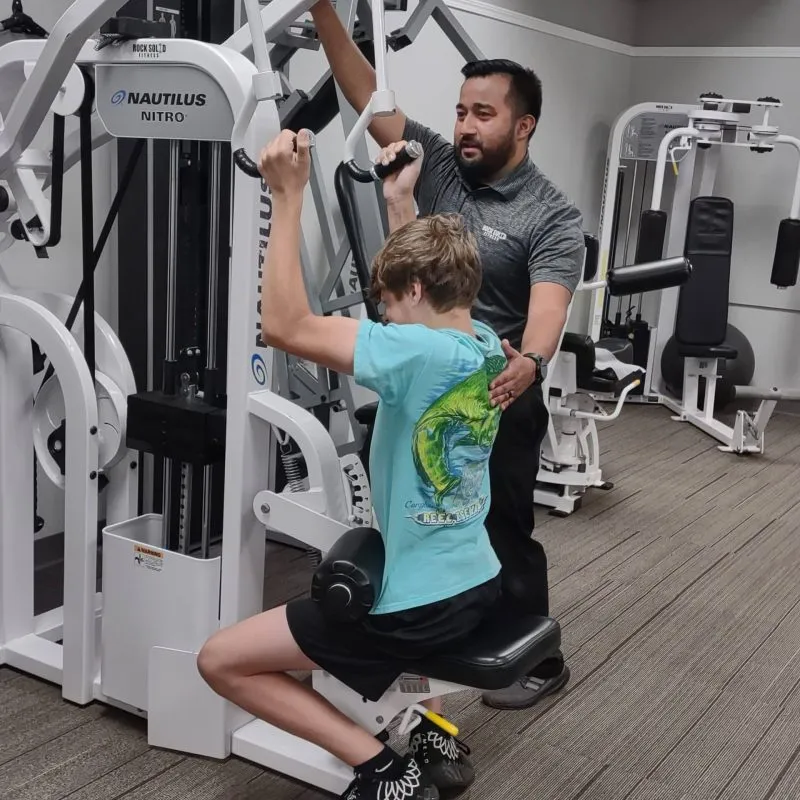 Youth Athlete Strength Training On Nautilus Pulldown